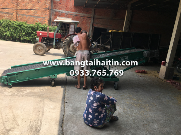 băng tải nghiêng tiếp đất